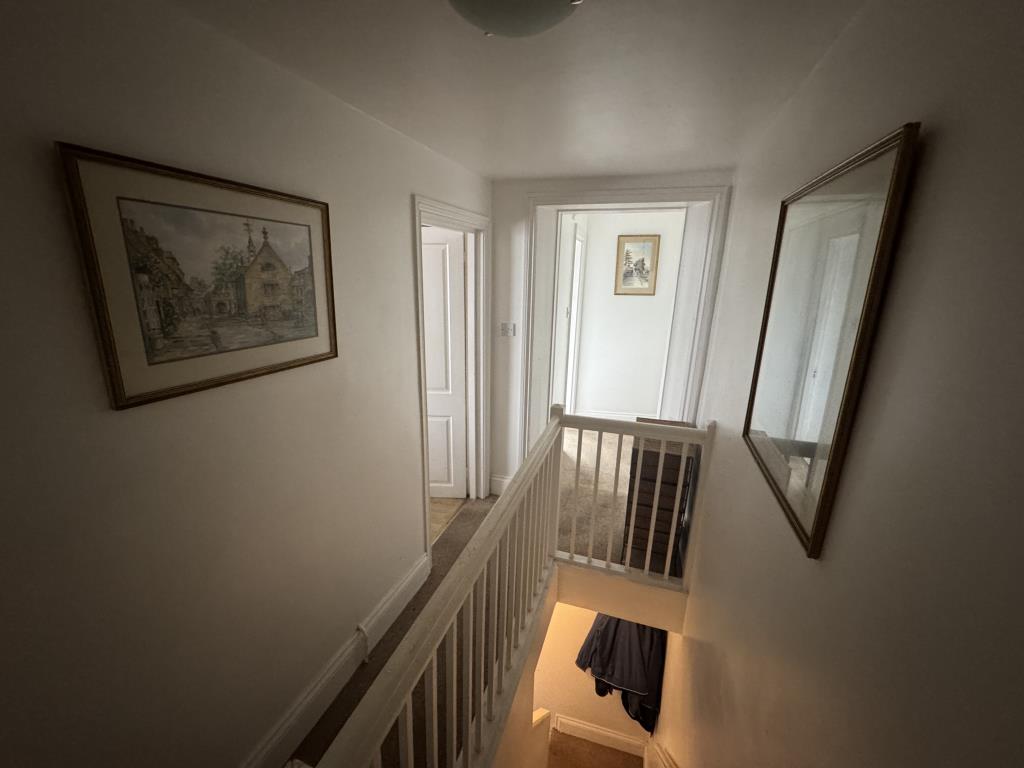 Lot: 6 - TOWN CENTRE MAISONETTE WITH GARDEN FOR INVESTMENT OR OCCUPATION - Landing with stairs